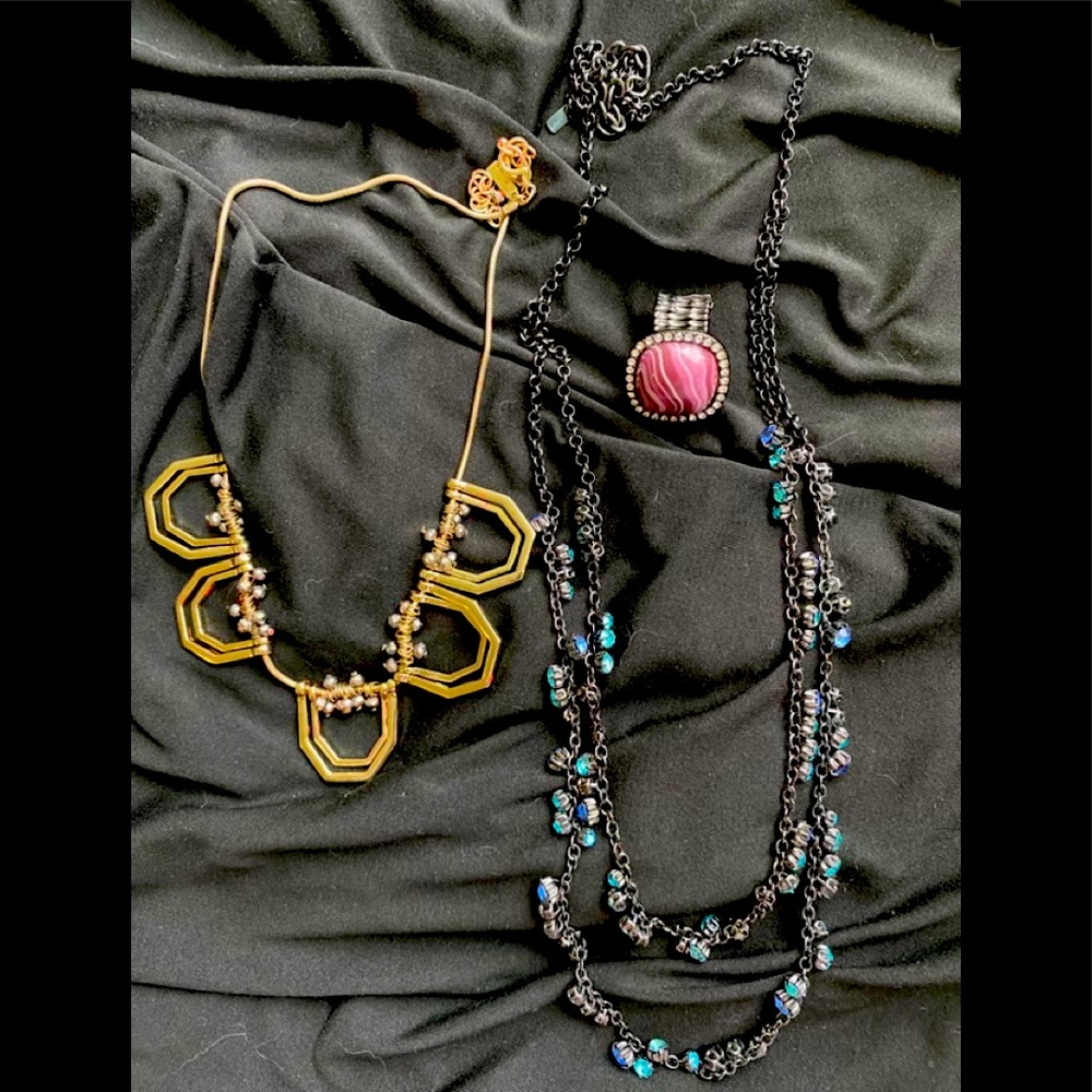 Two necklaces one Elastic band ring